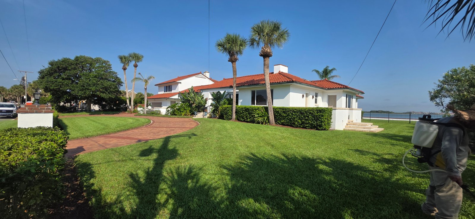 Waterfront home lawn and landscaping maintained by R.C. Property Maintenance